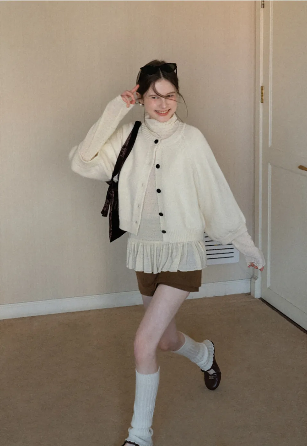 floral dot long sleeve top with ruffle hem