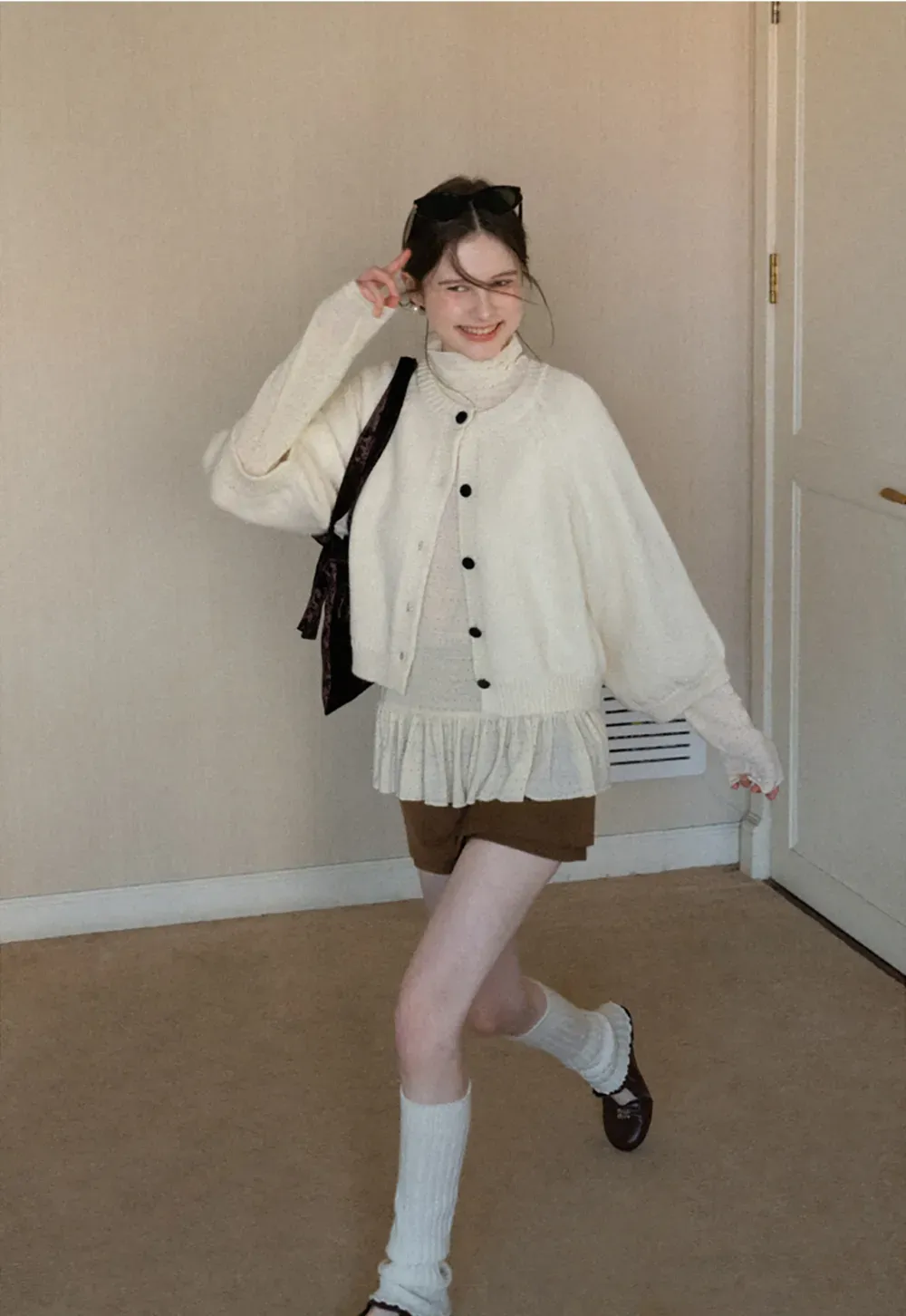 floral dot long sleeve top with ruffle hem