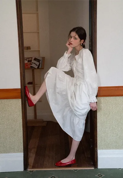 Shirt with ruffled sleeves and layered skirt