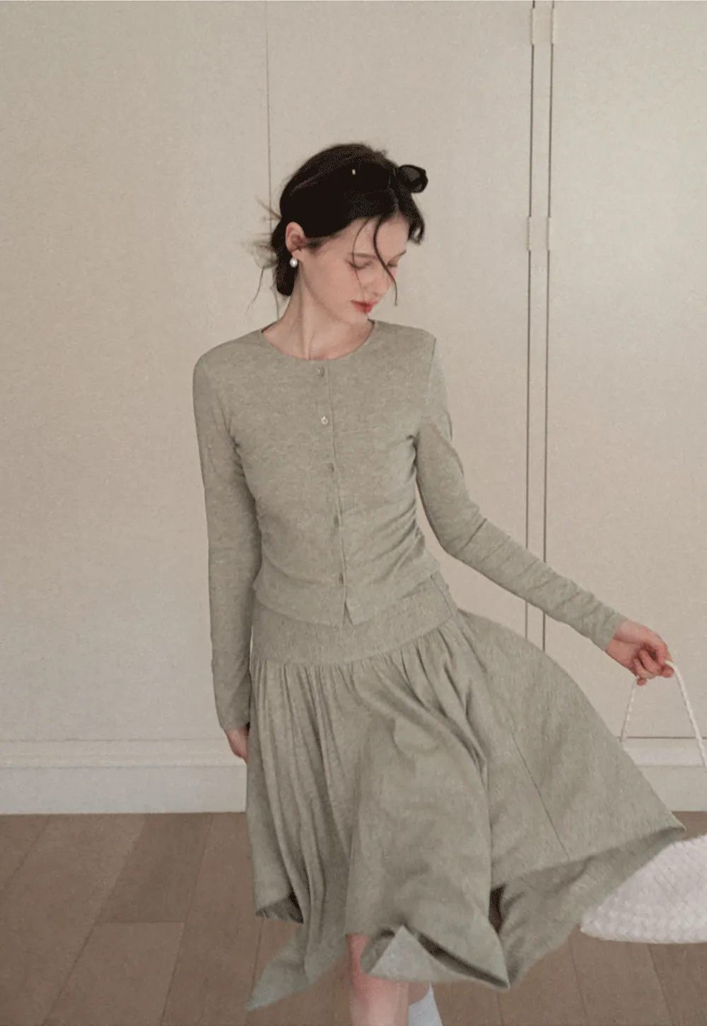 Long sleeve button front top and asymmetrical skirt