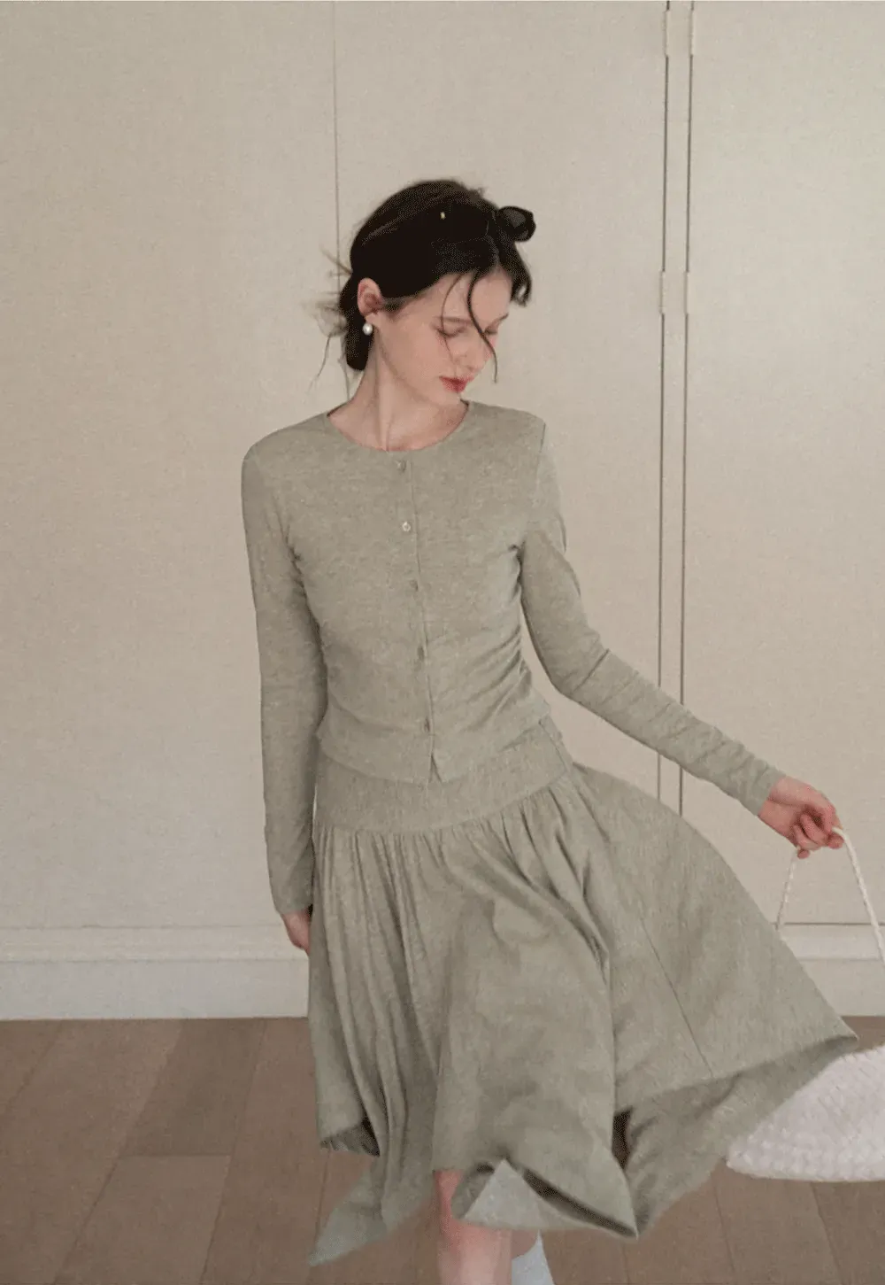 Long sleeve button front top and asymmetrical skirt