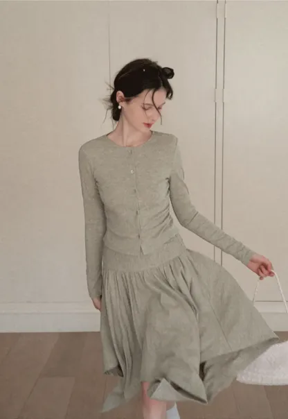 Long sleeve button front top and asymmetrical skirt