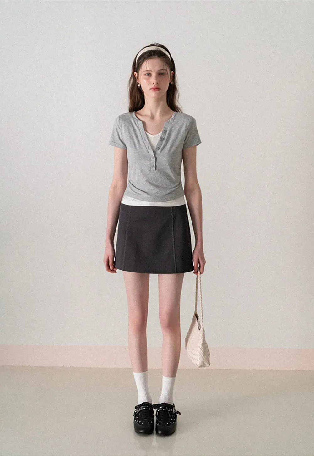 A-line mini skirt with contrast stitching and belt