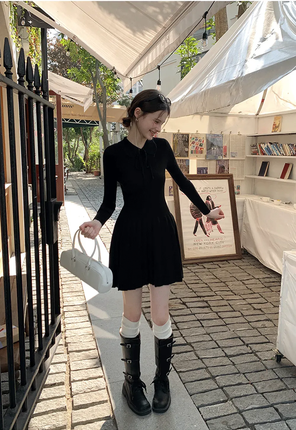 Elegant Knit Dress with Bow Detail and Flared Hem