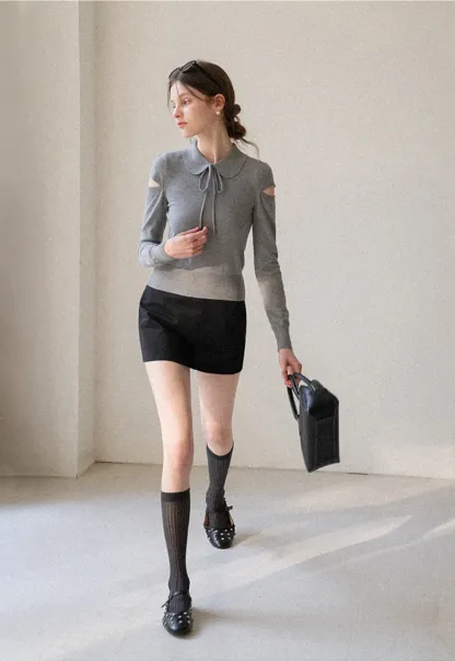 Elegant Knit Sweater with Bow Detail and Cutout Sleeves