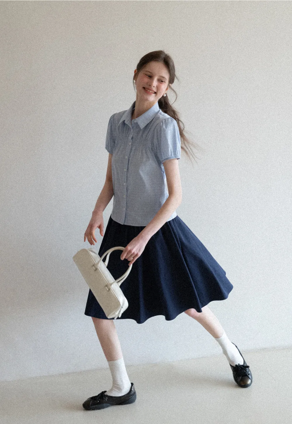 A-line pleated midi skirt with waistband