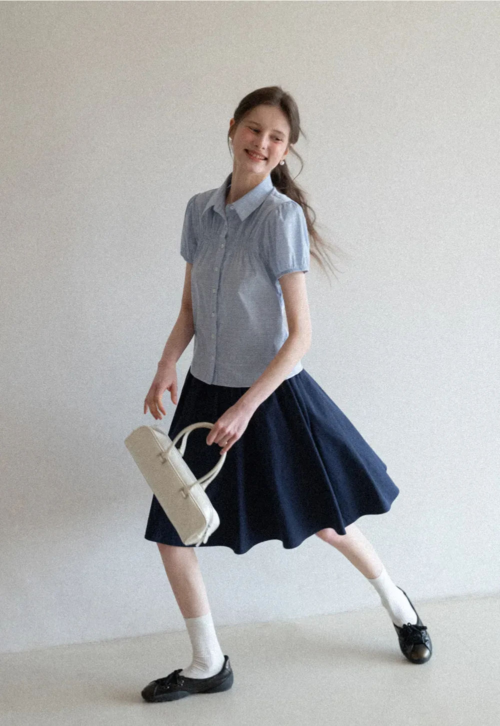 A-line pleated midi skirt with waistband