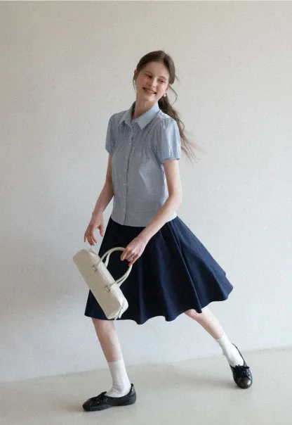 A-line pleated midi skirt with waistband