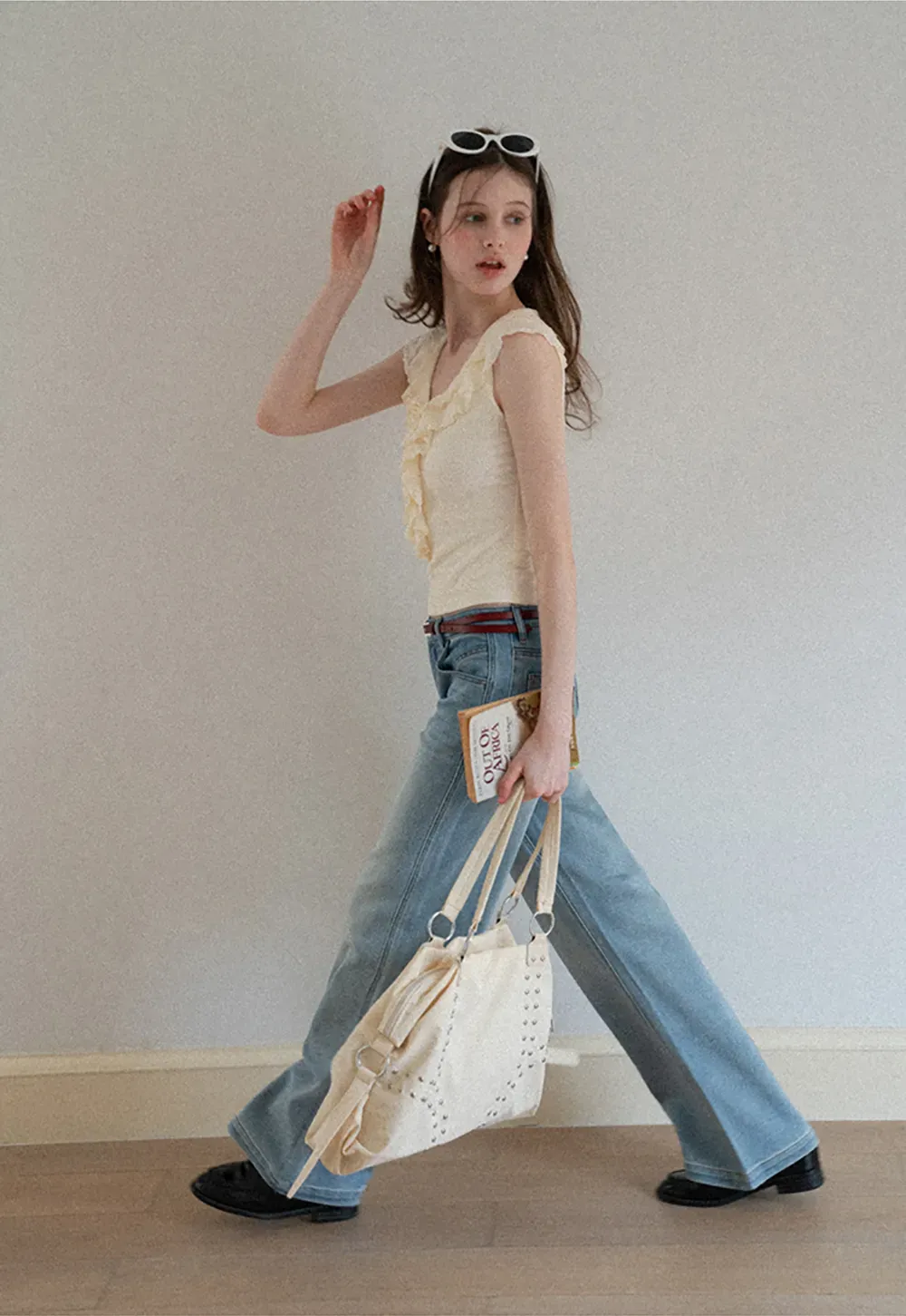 Sleeveless Top with Ruffled V Neck and Floral Detail