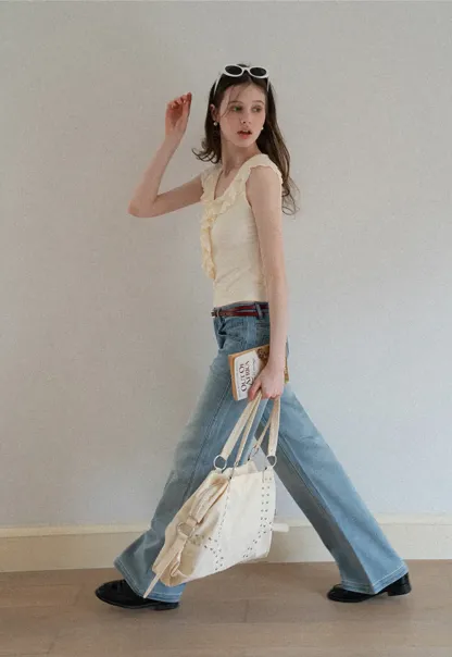 Sleeveless Top with Ruffled V Neck and Floral Detail