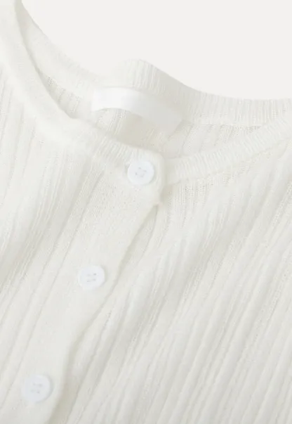 Ribbed knit sweater with V neckline and long sleeves