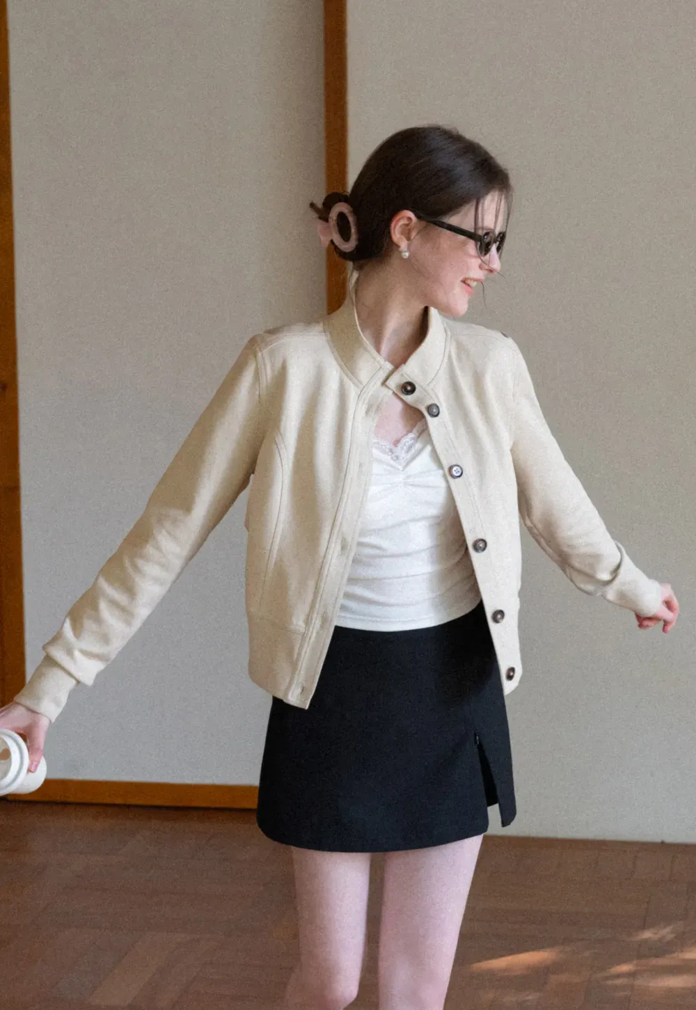 Short jacket with button front and ribbed cuffs