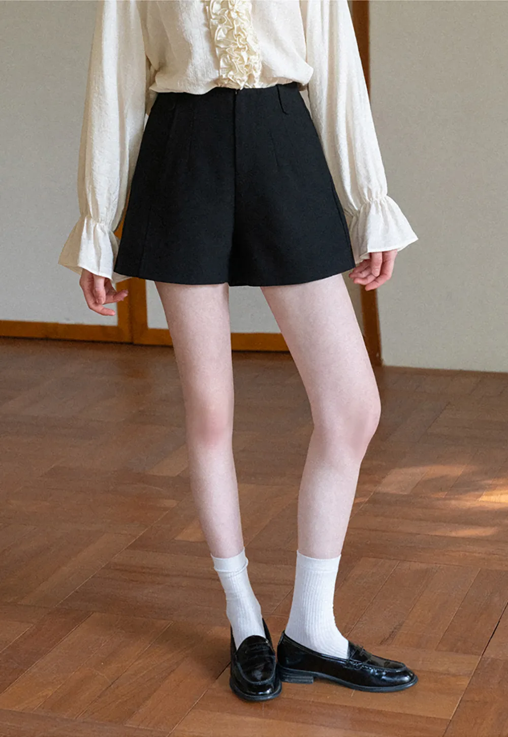 High waist pleated shorts with flared hem