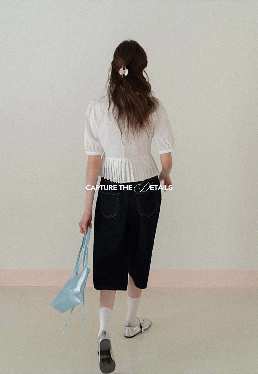 V neck short sleeve blouse with pleated hem and tie front