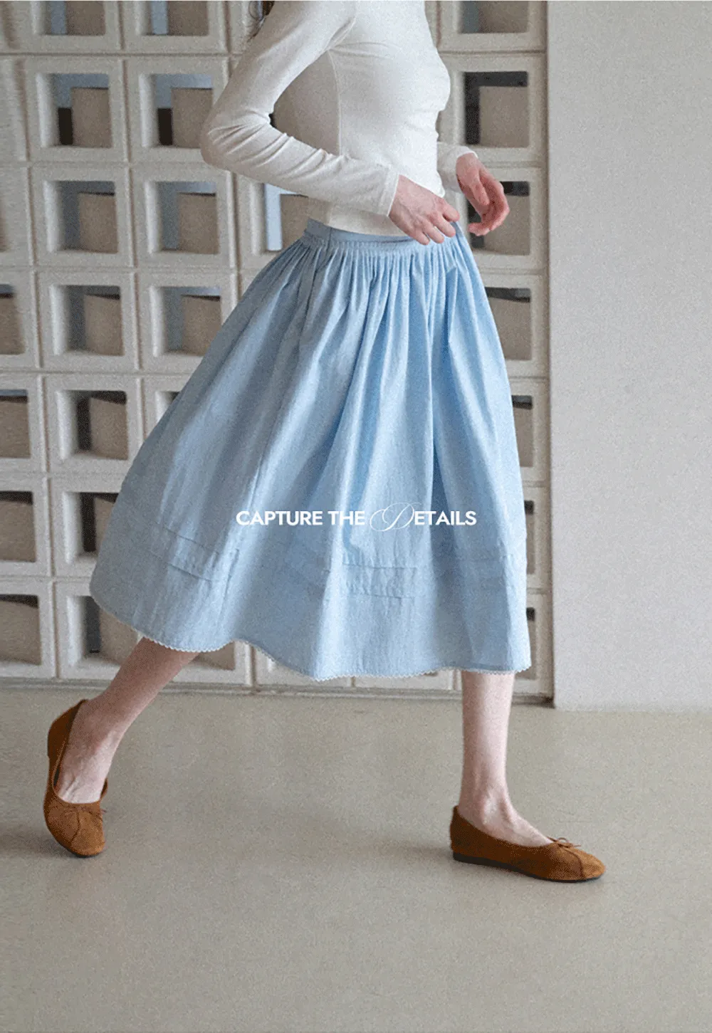 Lightweight pleated midi skirt with elastic waist