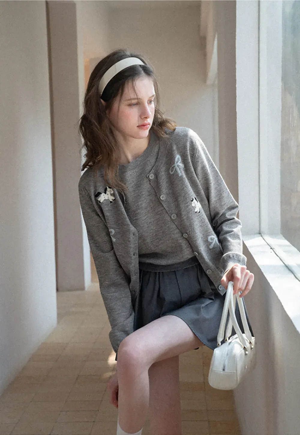 Woolen knit sweater with horse and bow motifs