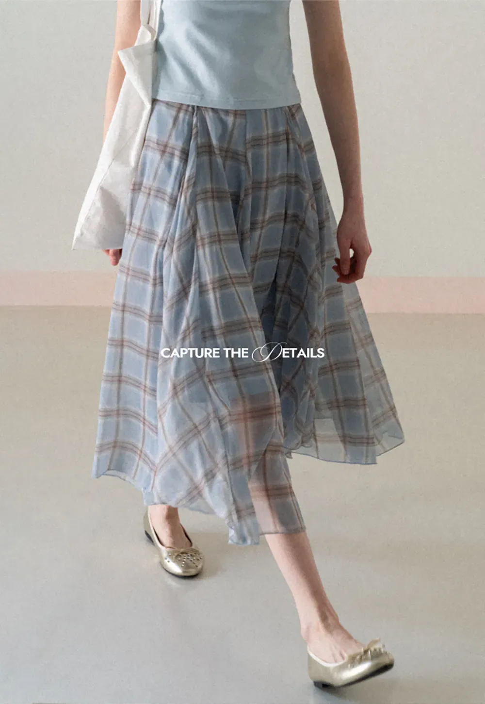 Pleated Plaid Midi Skirt with Asymmetrical Hem