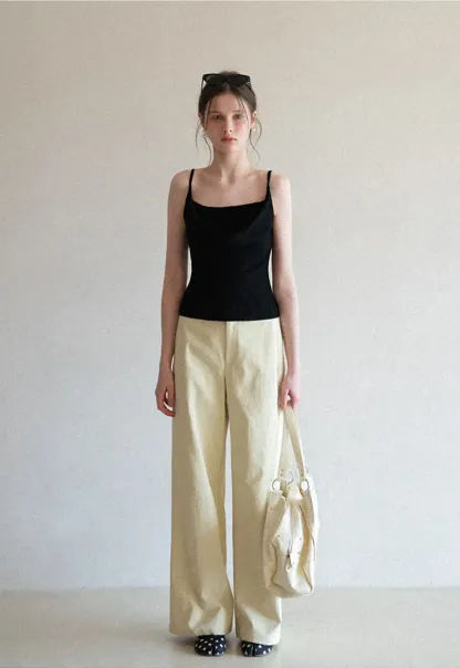 Silk-like tank top with thin straps and draped neckline