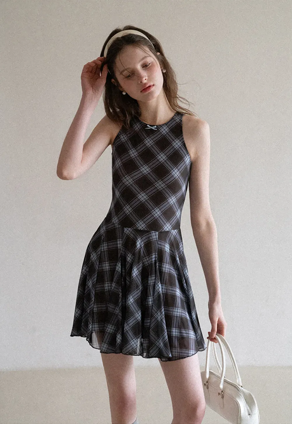 Plaid sleeveless dress with flared skirt