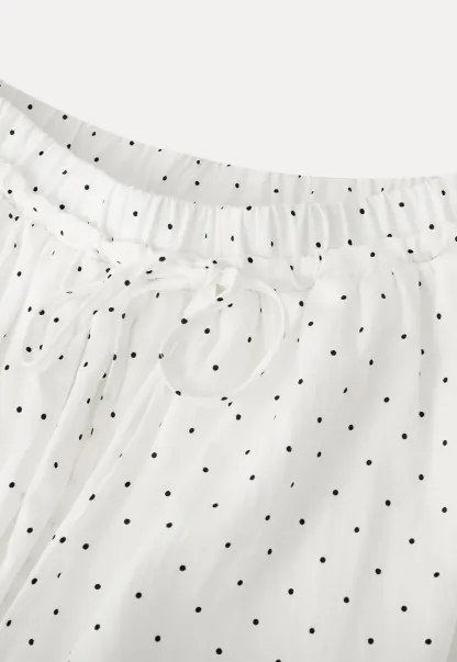 Polka dot pleated mini skirt with drawstring waist