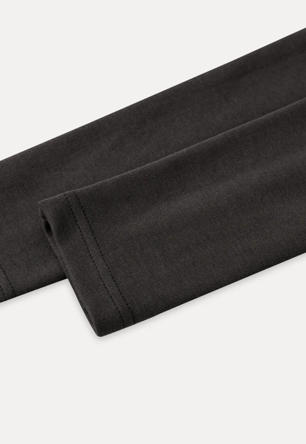 Long sleeve crop top with round neck and hem stitching design