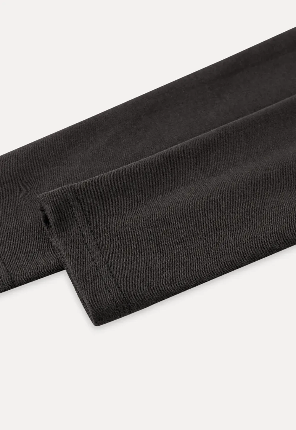 Long sleeve crop top with round neck and hem stitching design