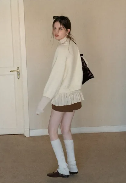 Soft knit cardigan with button front and relaxed fit