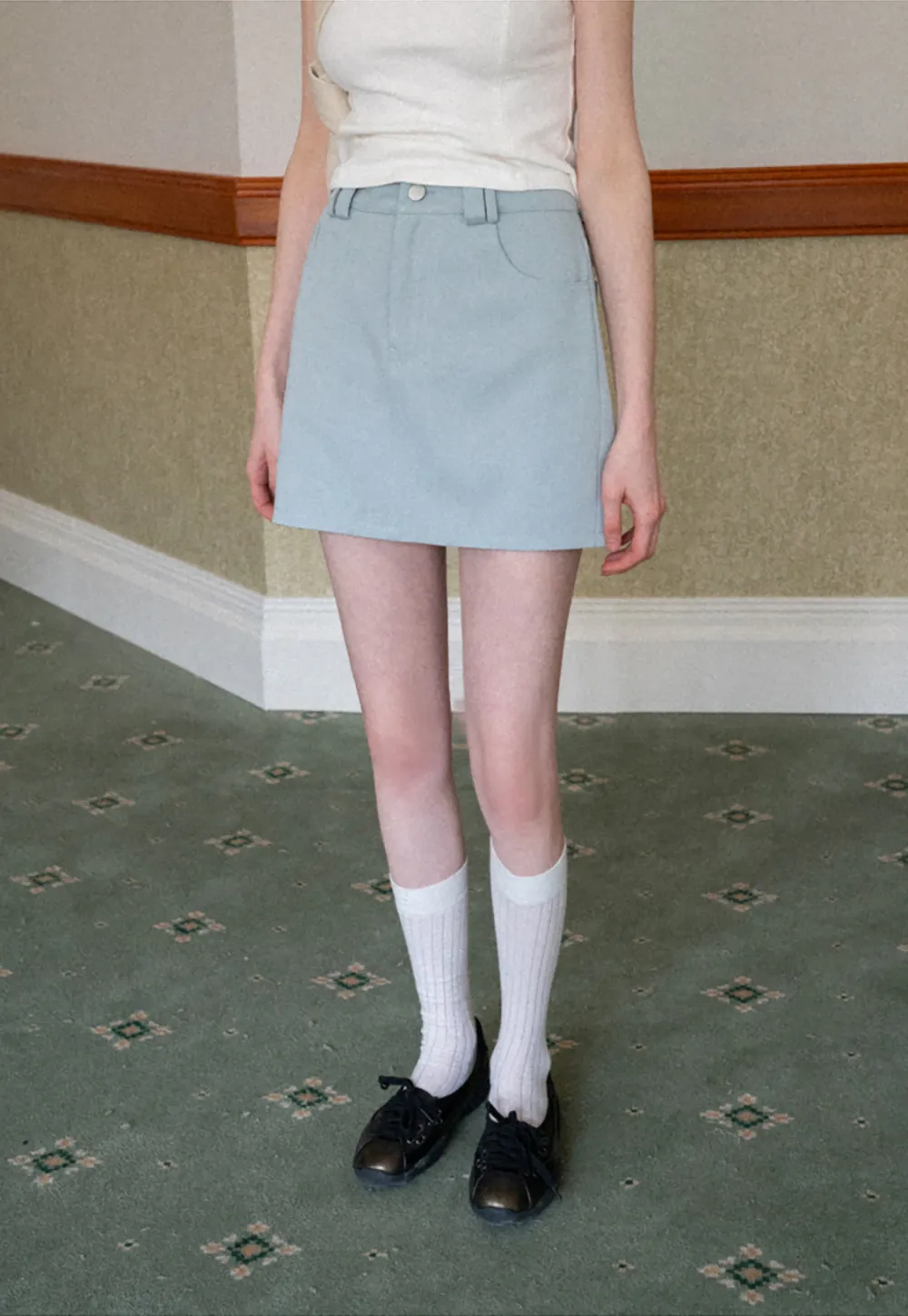 A-line mini skirt with front zipper and belt loops