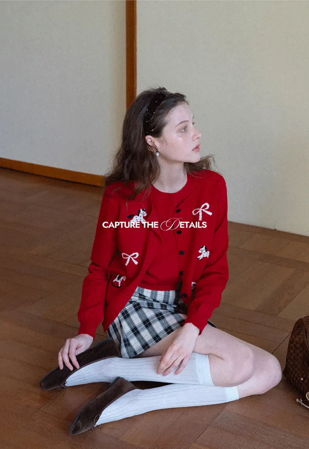 Woolen knit sweater with horse and bow motifs