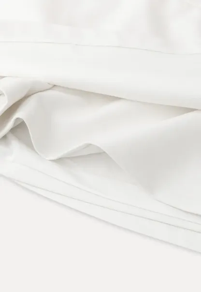 Elegant Pleated Mini Skirt with Asymmetrical Hem