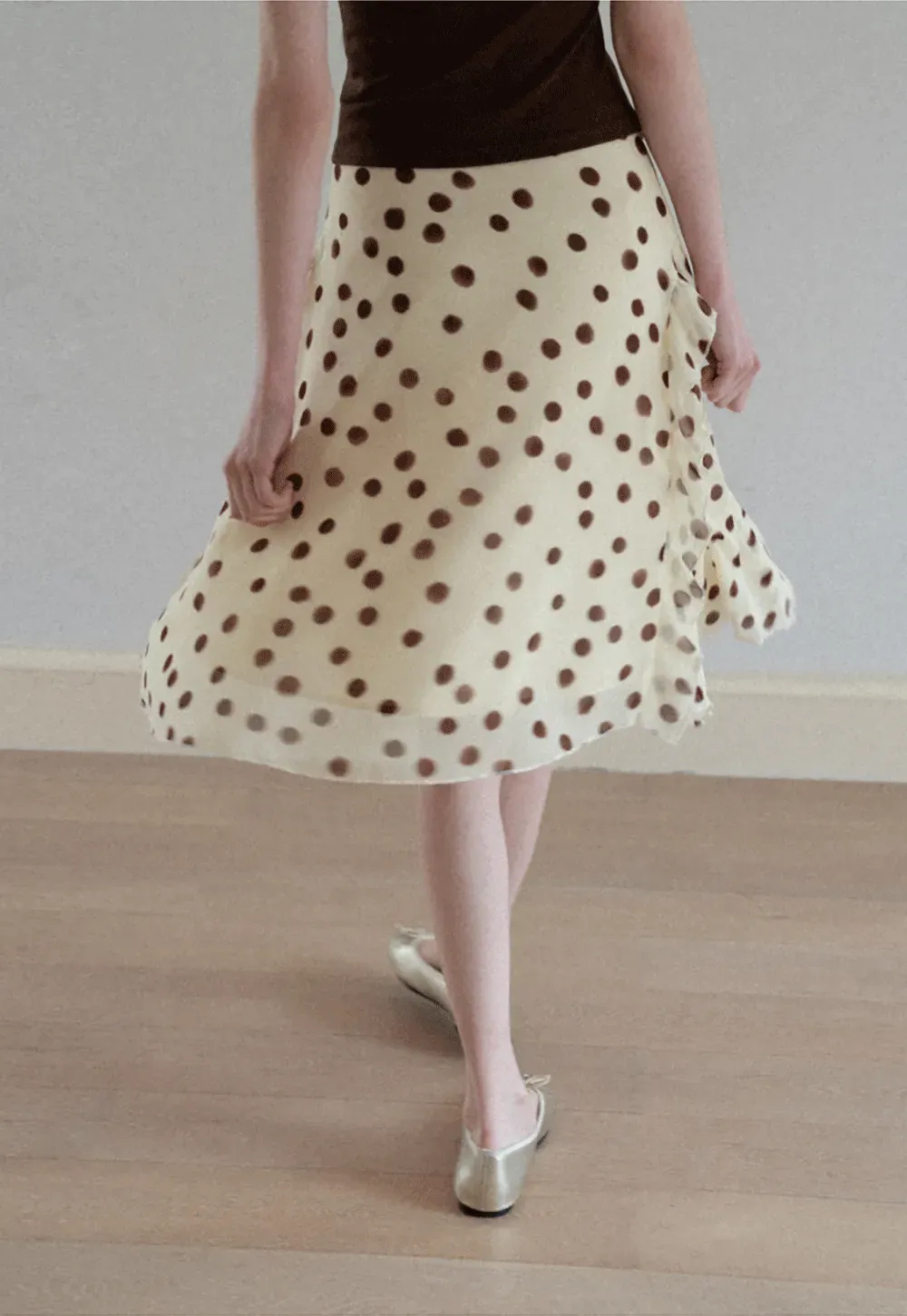 Polka dot ruffled asymmetrical midi skirt