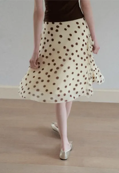 Polka dot ruffled asymmetrical midi skirt