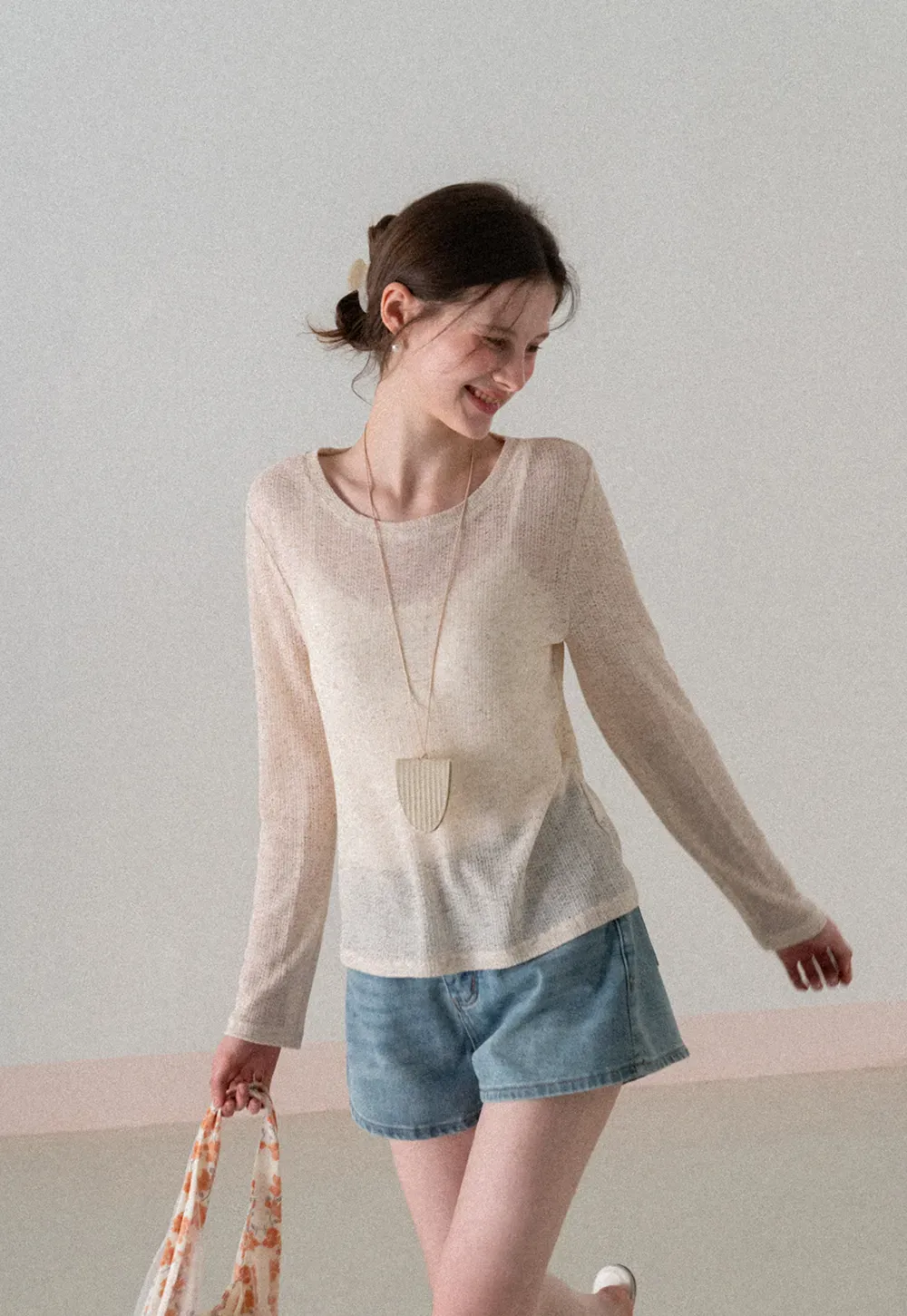 Long sleeve sheer knit top with round neckline