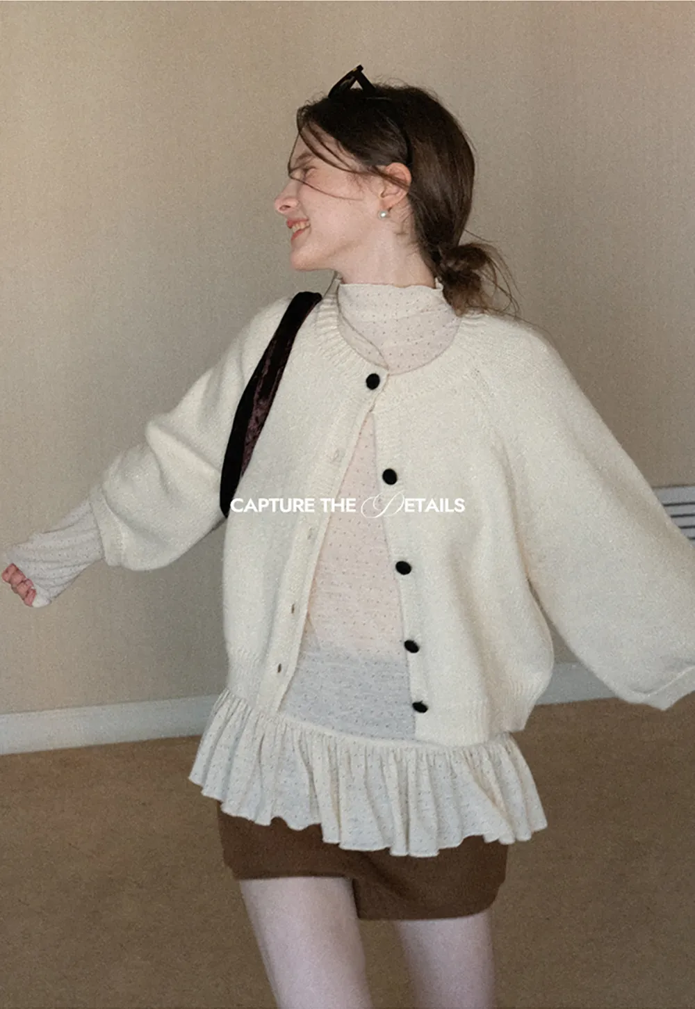 Soft knit cardigan with button front and relaxed fit