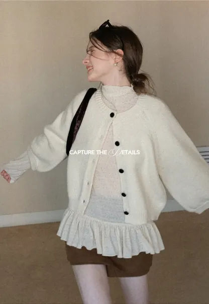 Soft knit cardigan with button front and relaxed fit