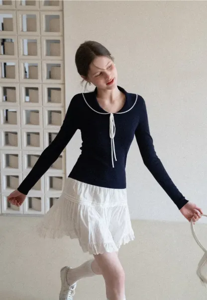 Eyelet Trimmed Tiered Skirt with Ruffled Hem