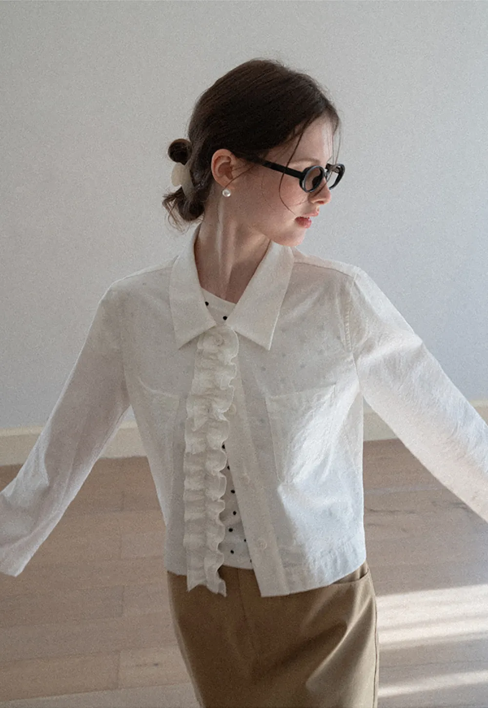 Short jacket with ruffled front placket and collar