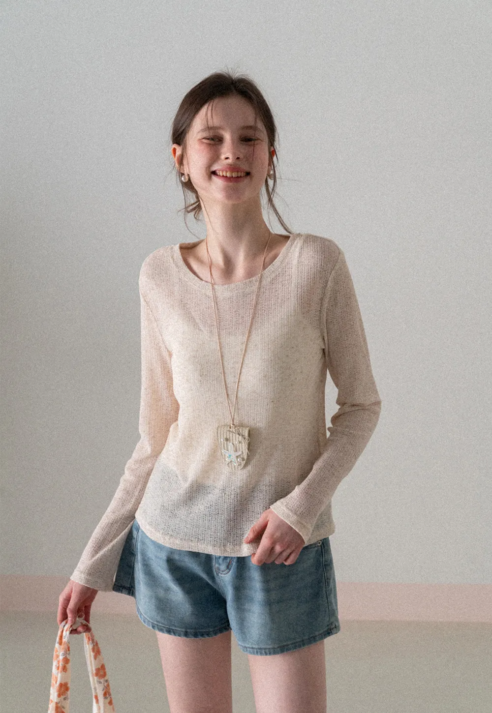 Long sleeve sheer knit top with round neckline