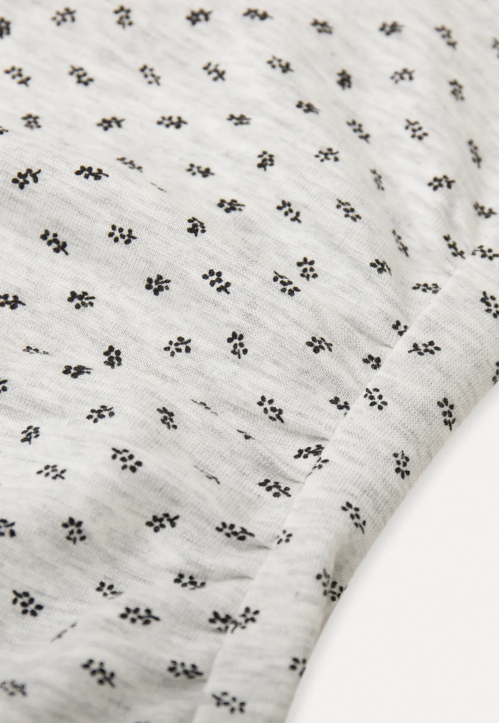 Polka dot dress with lace trim and matching cardigan