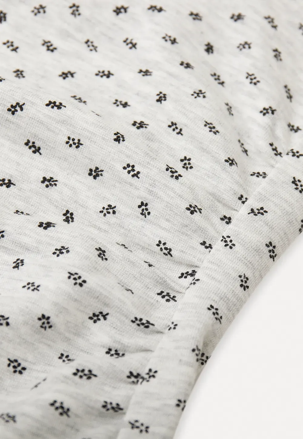 Polka dot dress with lace trim and matching cardigan