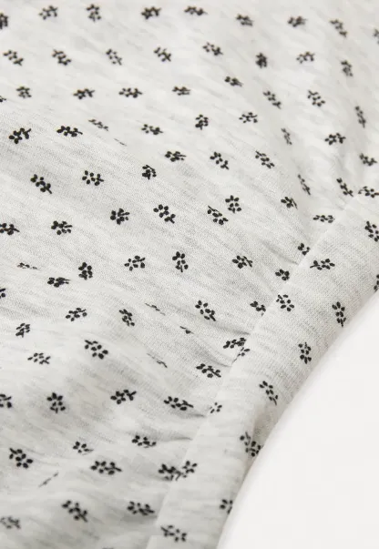 Polka dot dress with lace trim and matching cardigan