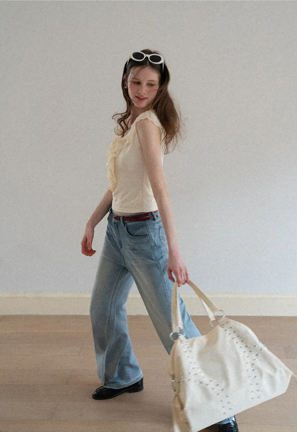 Sleeveless Top with Ruffled V Neck and Floral Detail