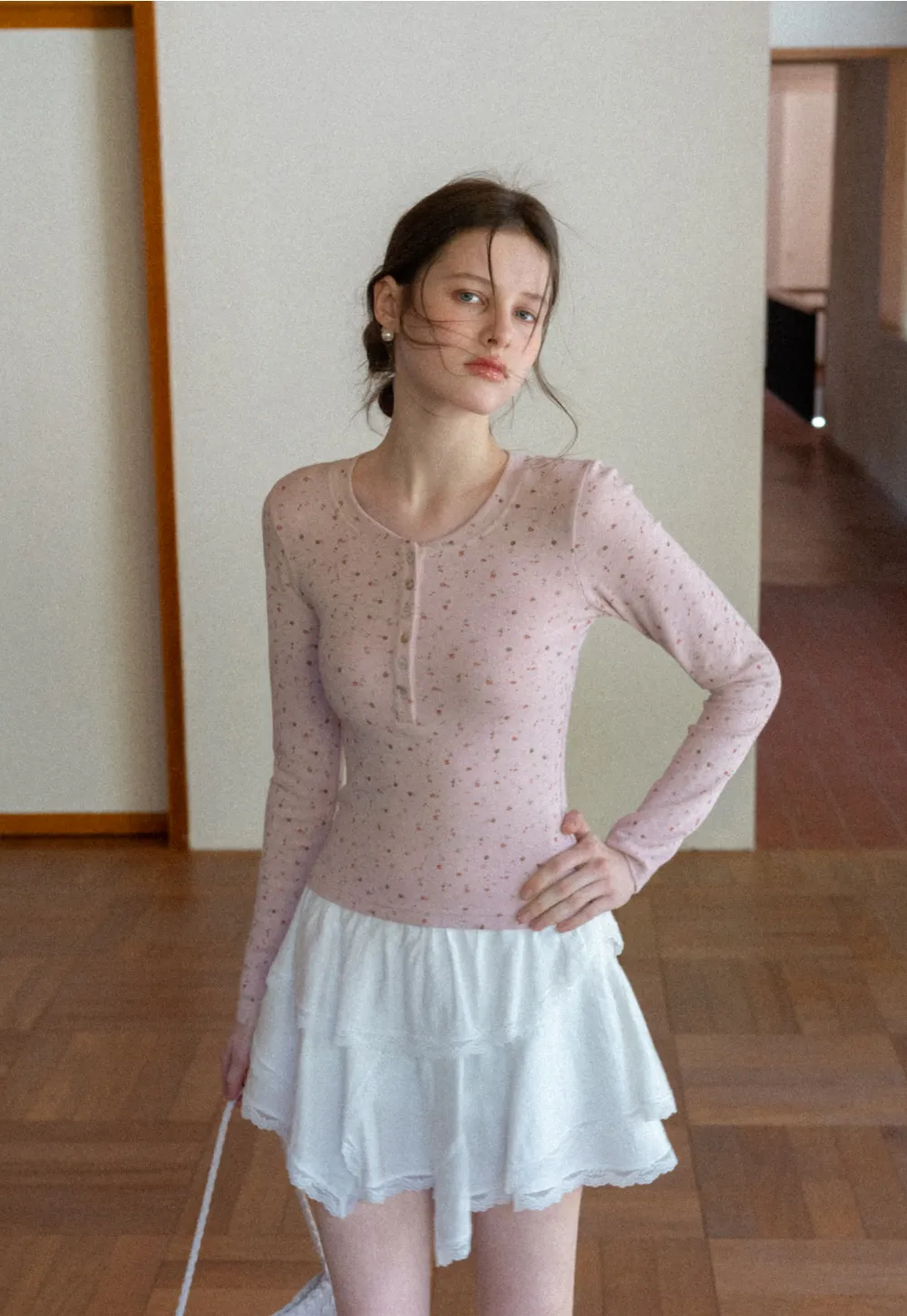 Long sleeve button front top with floral print