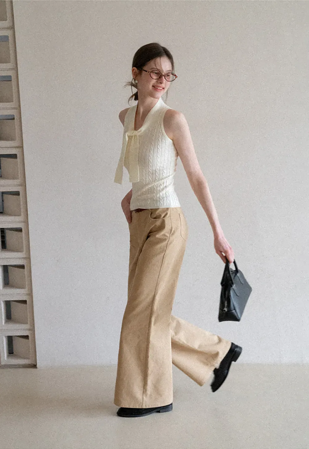 Knit Sleeveless Top with Front Bow Detail