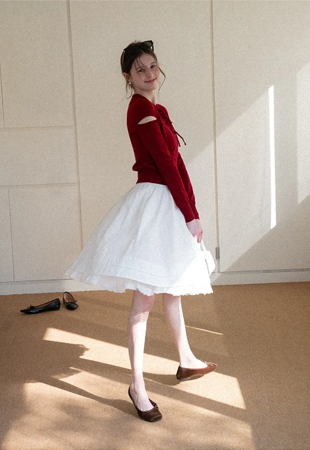 Elegant Knit Sweater with Bow Detail and Cutout Sleeves