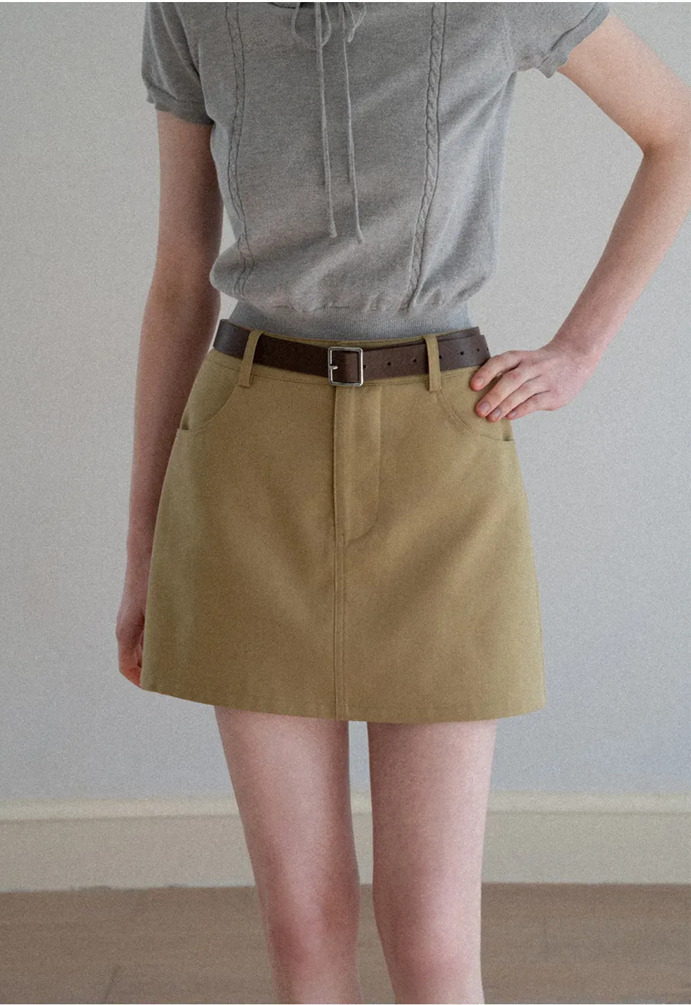 A-line mini skirt with front pockets and belt loops