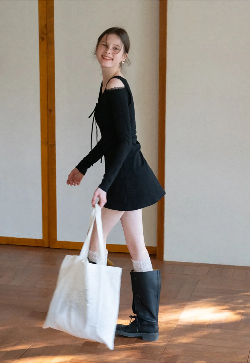 Sleeveless dress with front tie detail and t shirt