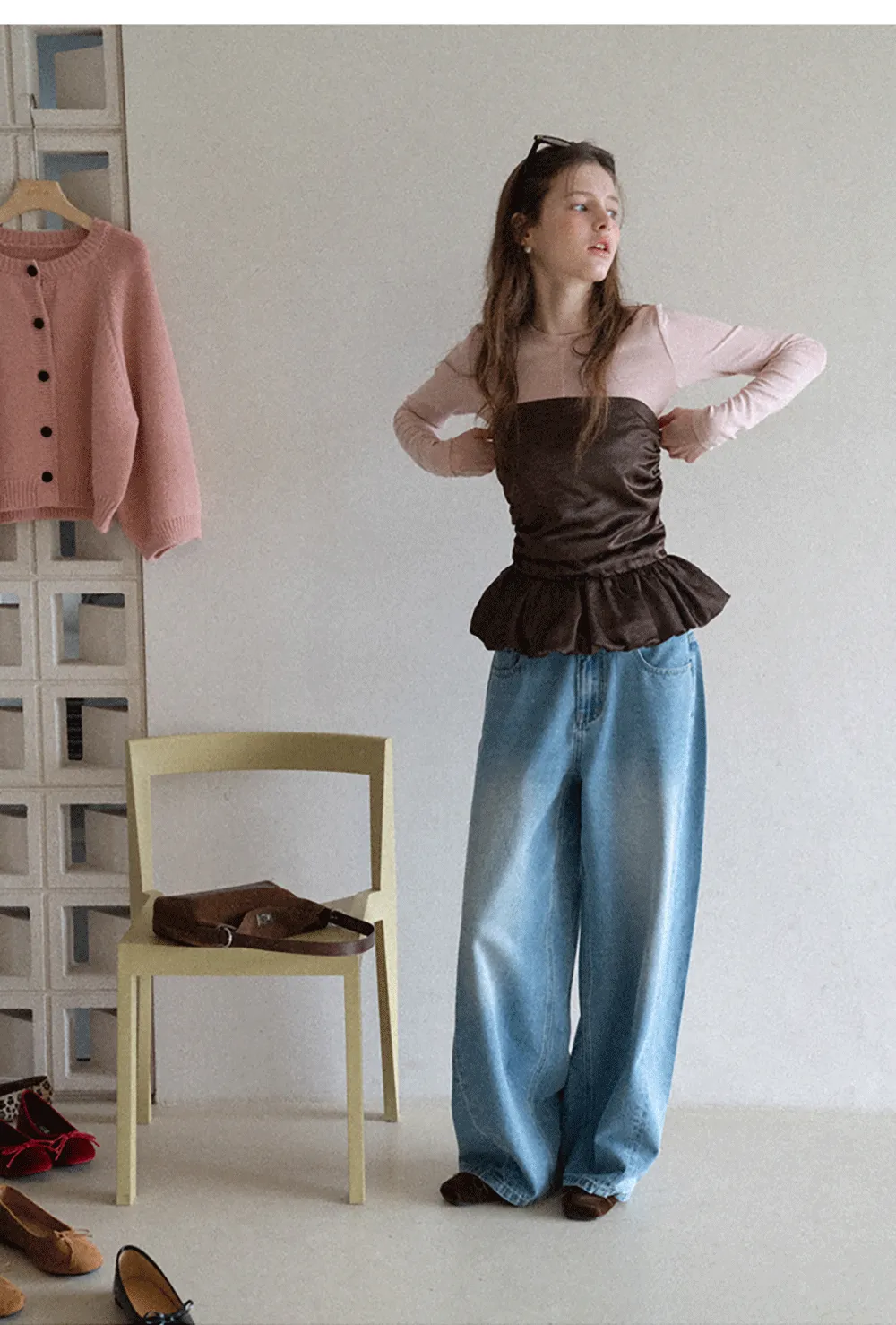 Long sleeve top with ruffled hem and layered design