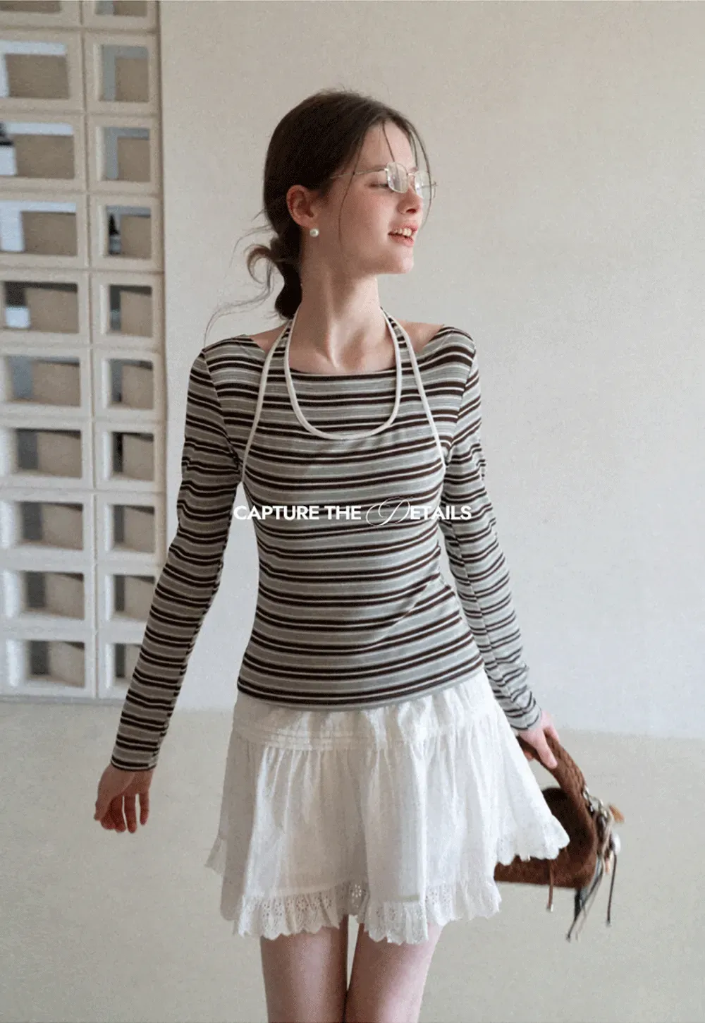 Long sleeve striped top with halter neck detail