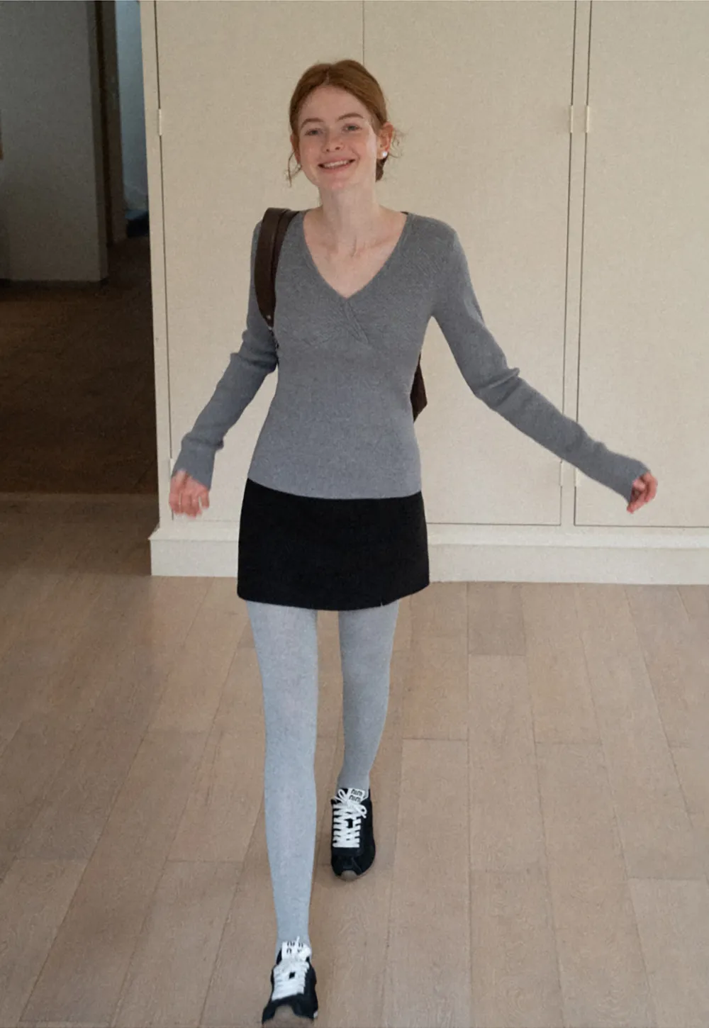 A-line mini skirt with textured fabric and central seam design